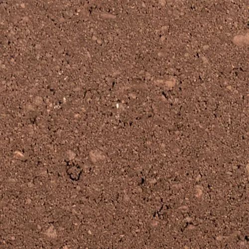 Close-up of reddish-brown soil, showing small rocks and granular texture.
