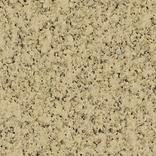 Tan, textured stucco wall.