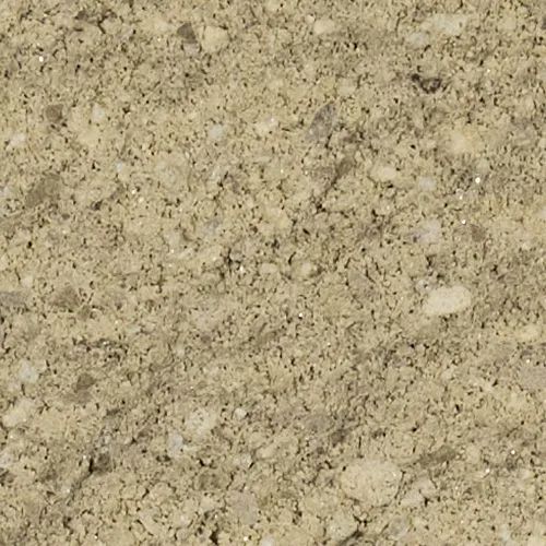 Close-up of a beige, speckled, textured surface.