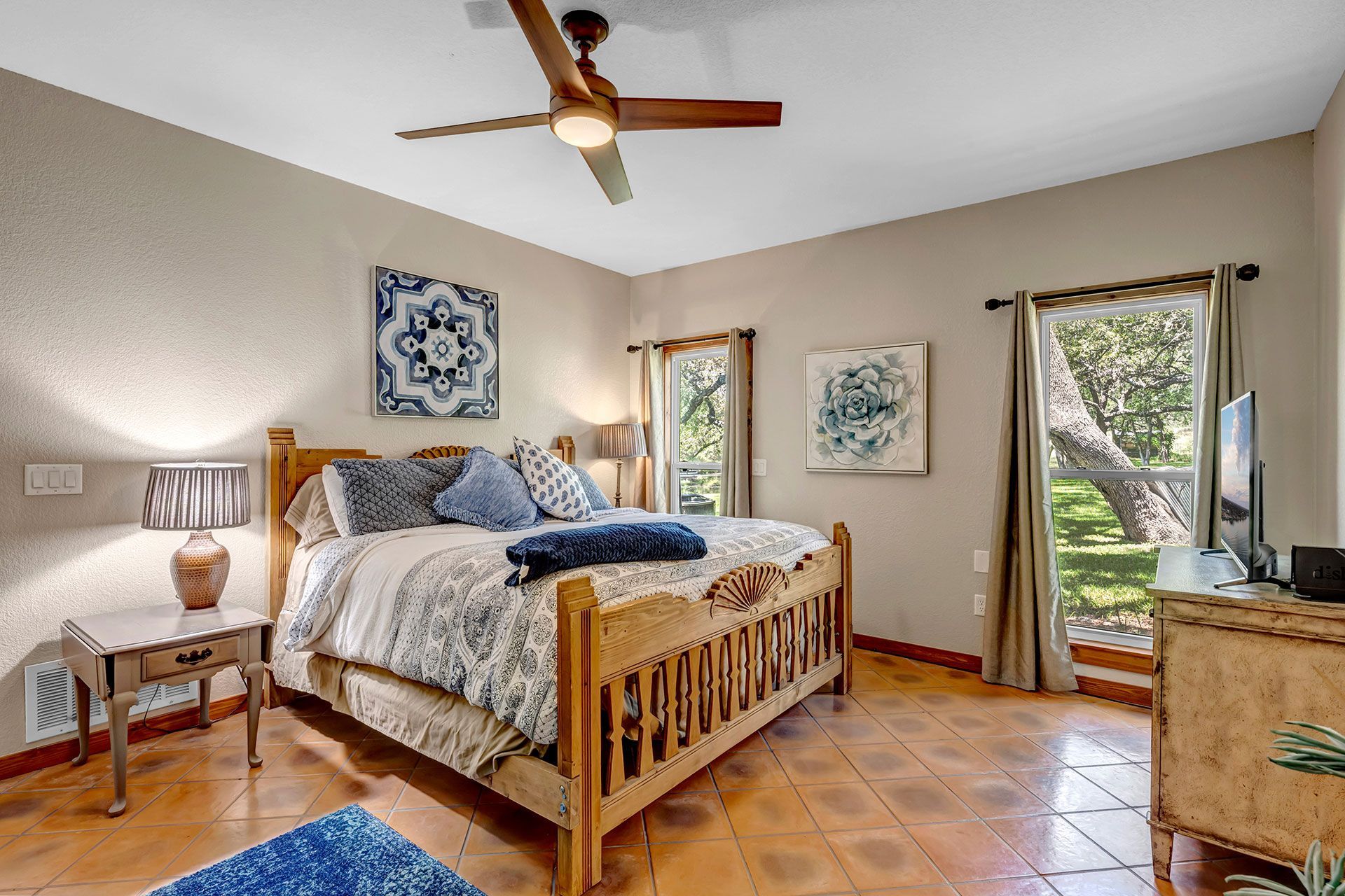 vacation rental bedroom with fan