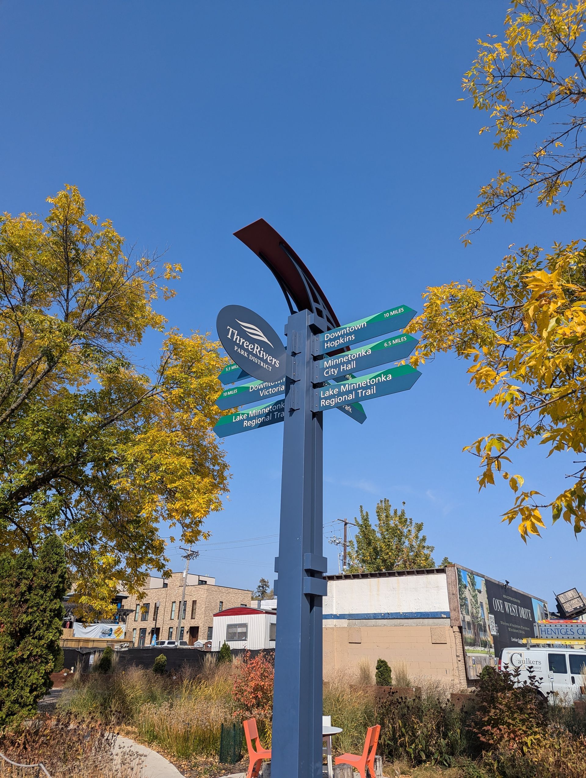 A street sign with a blue sky in the background