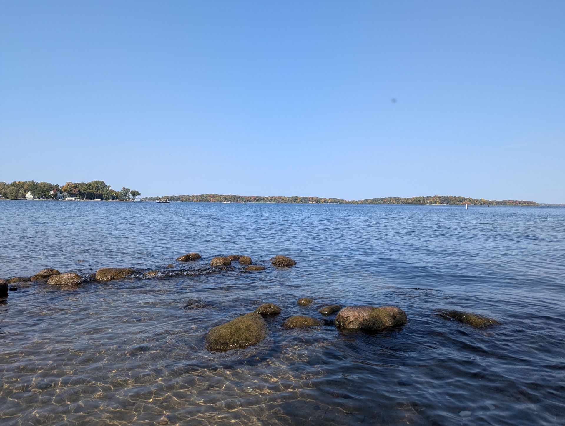 A large body of water with a lot of rocks in it
