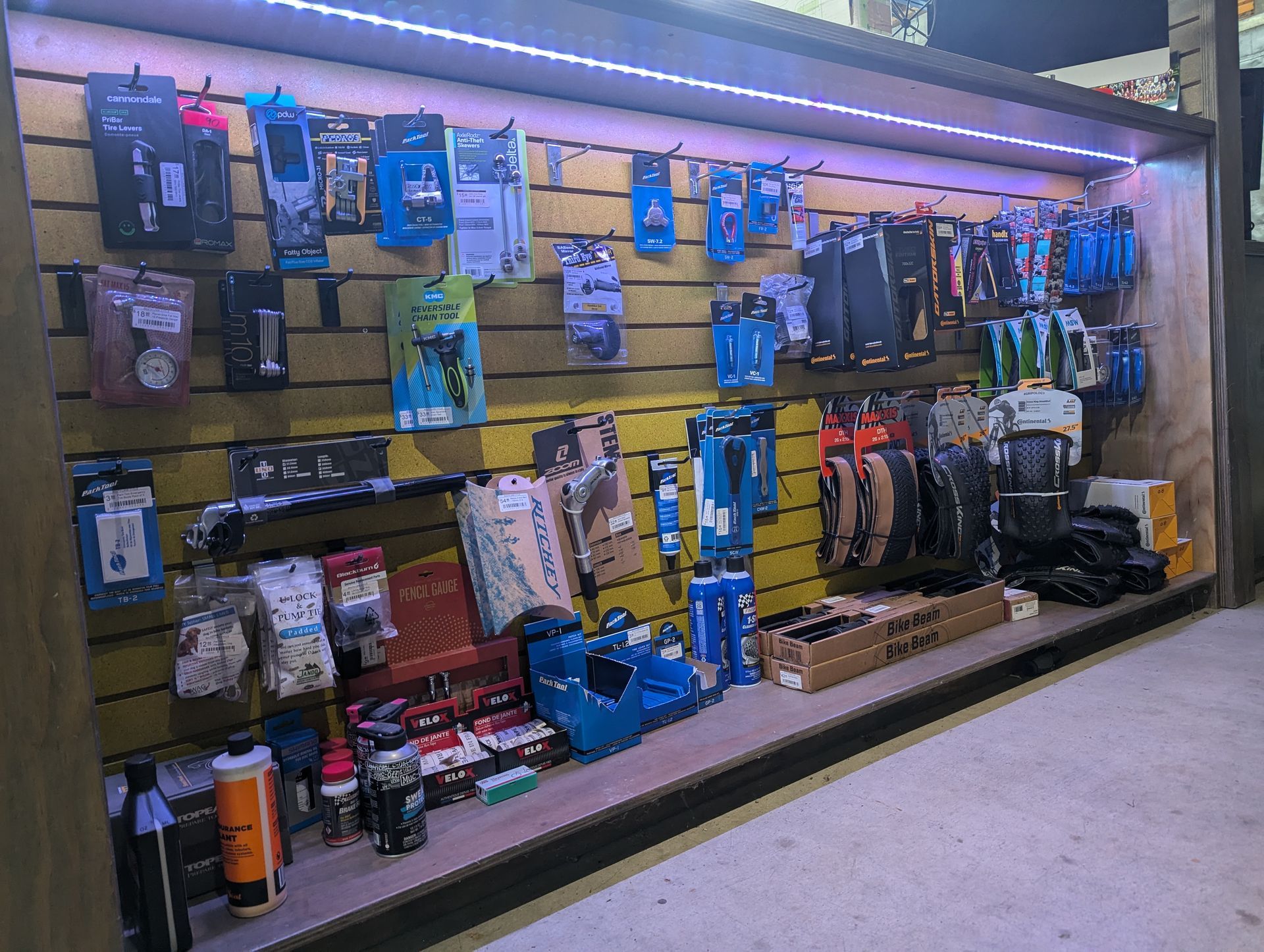 A display case filled with a variety of electronic items.