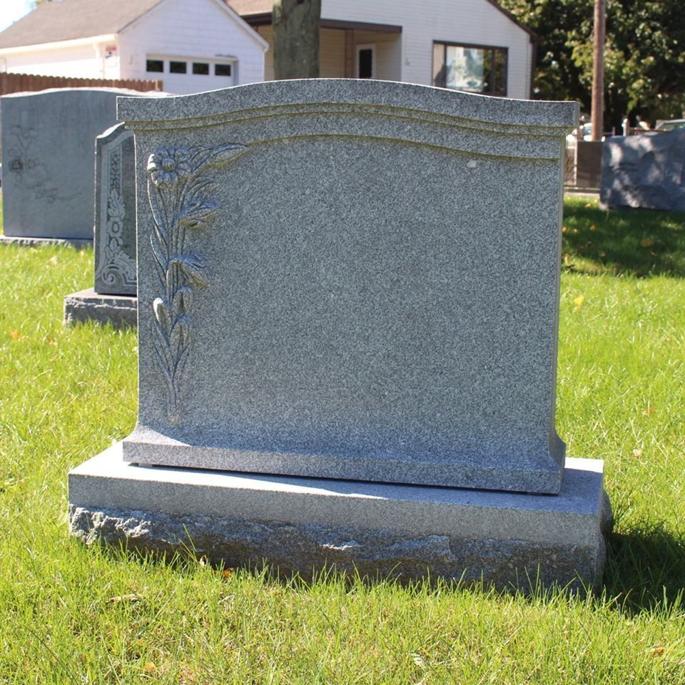 A gravestone in a cemetery