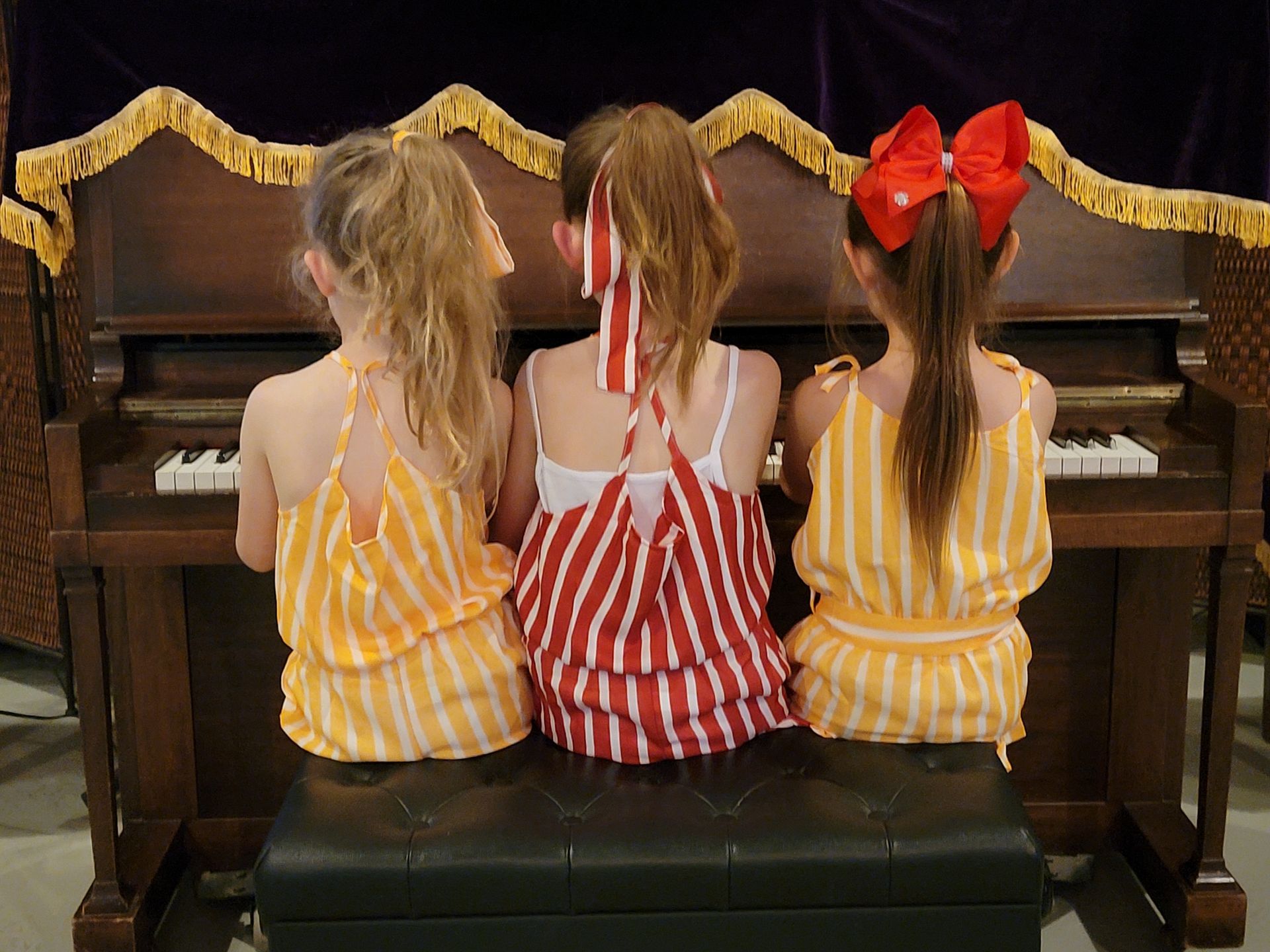 Three kids piano