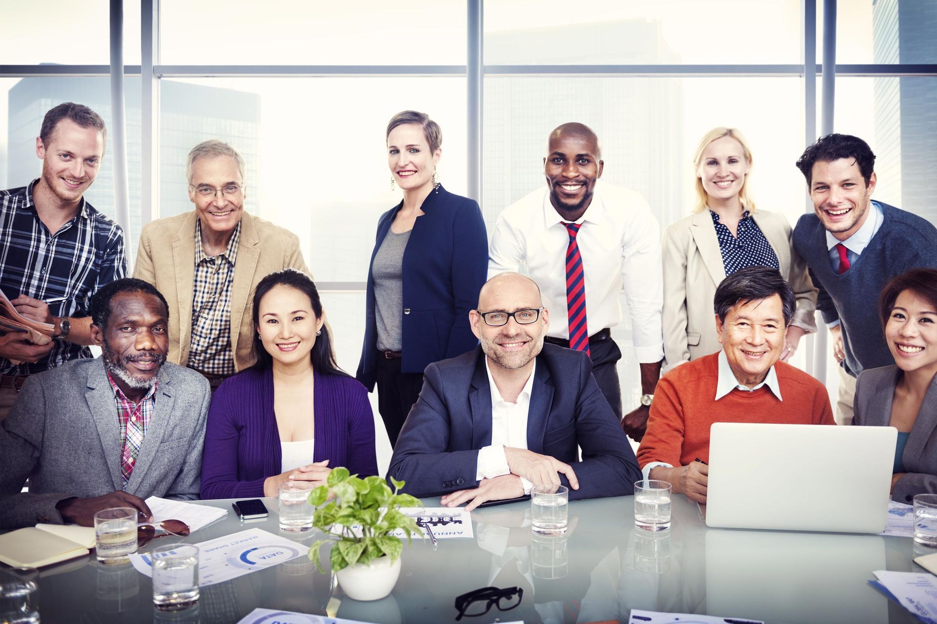 Diverse group of people inside conference room