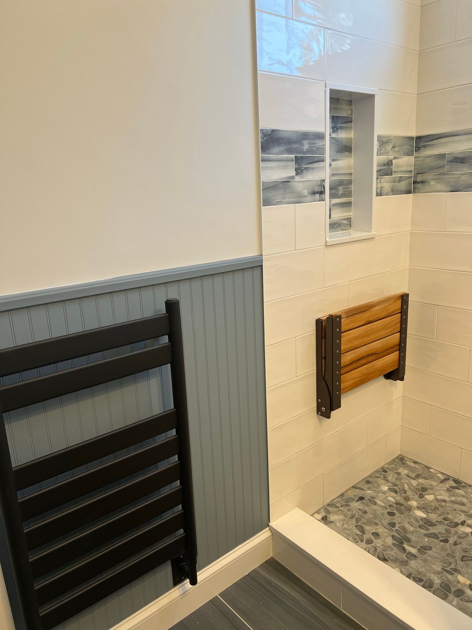 Bathroom with folded chair