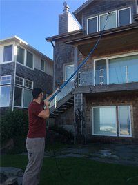 Home window cleaning using a wiper blade with long handle