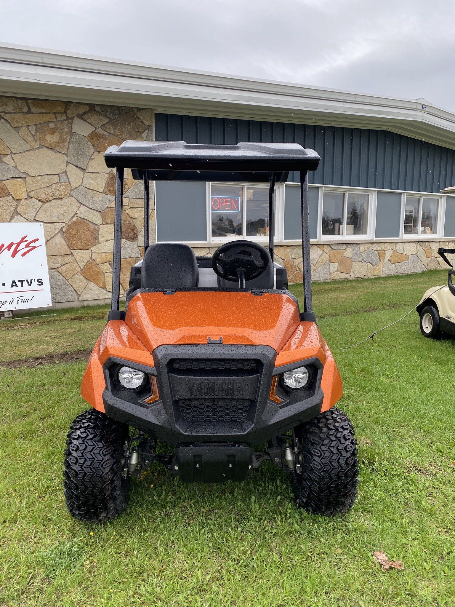 Orange golf cart