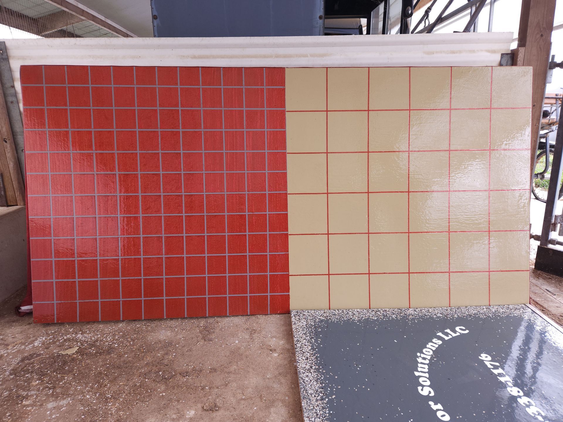 A red tile and a white tile are next to each other