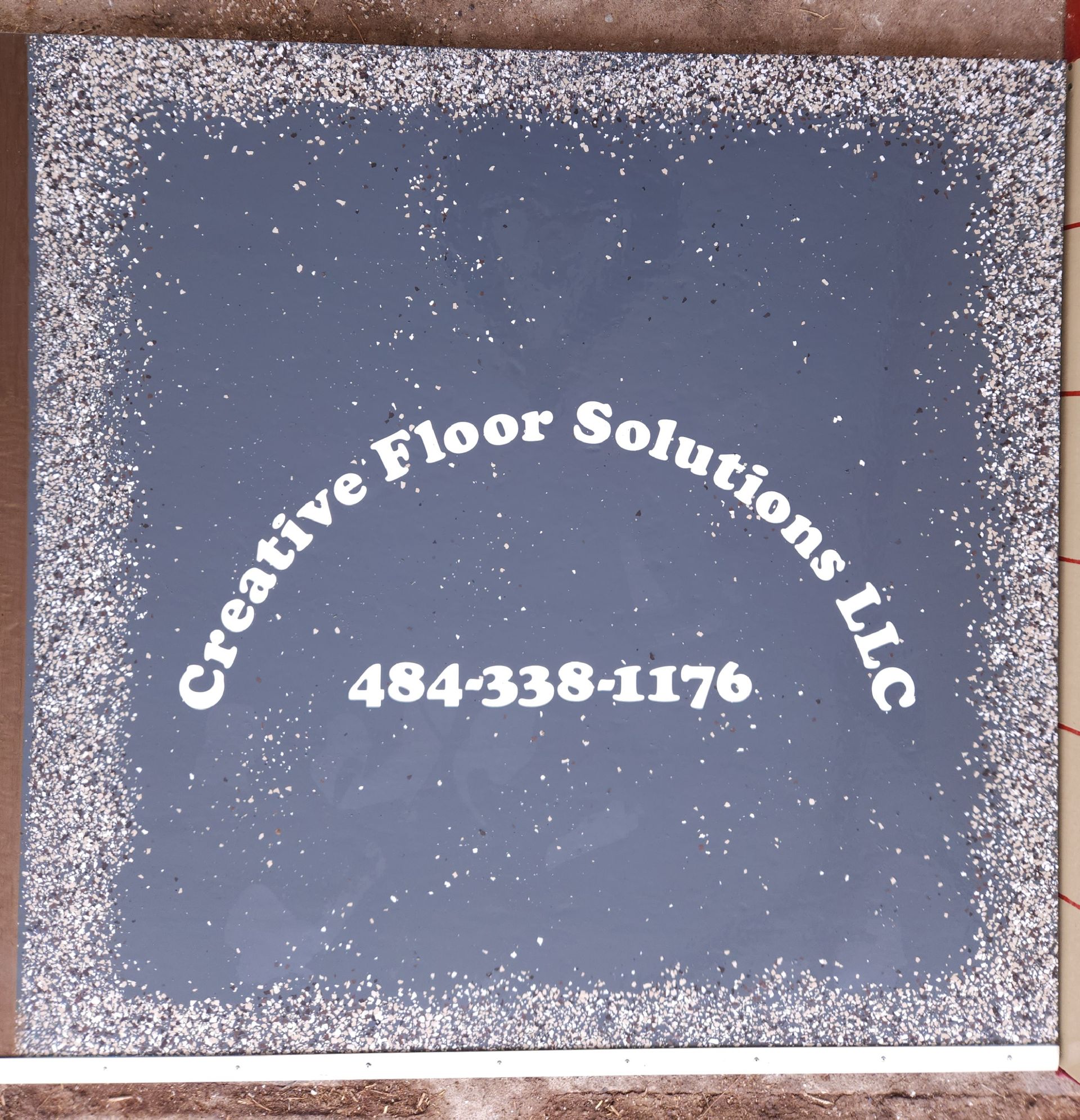 A sign that says creative floor solutions llc on it