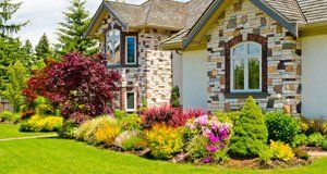 House with beautiful flower bed