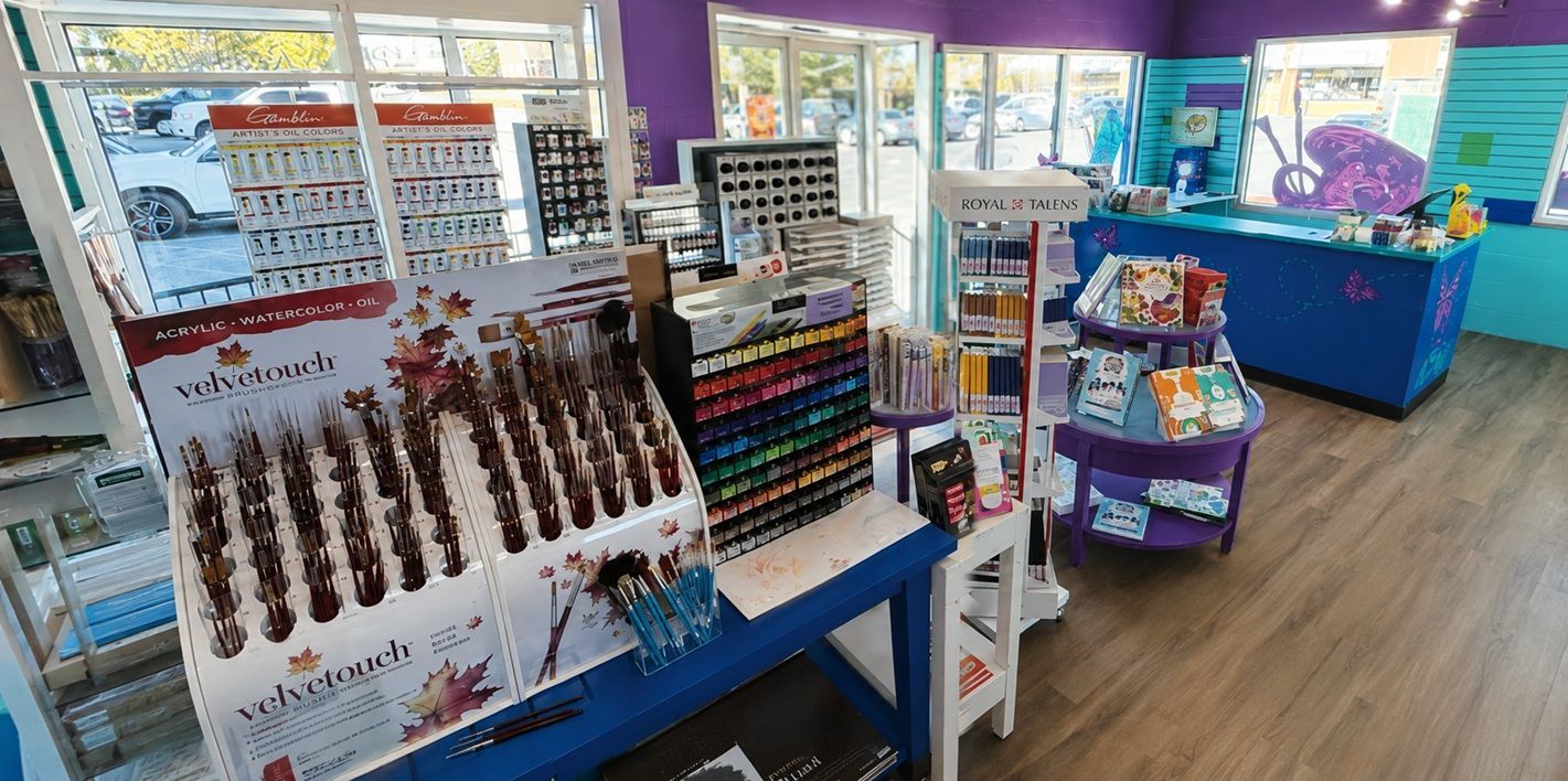 Bright art shop interior with colorful candy displays, shelves, and blue counters on a wood floor
