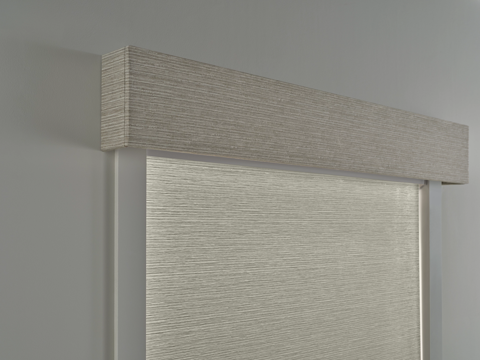 A close up of a window with a blind on it.