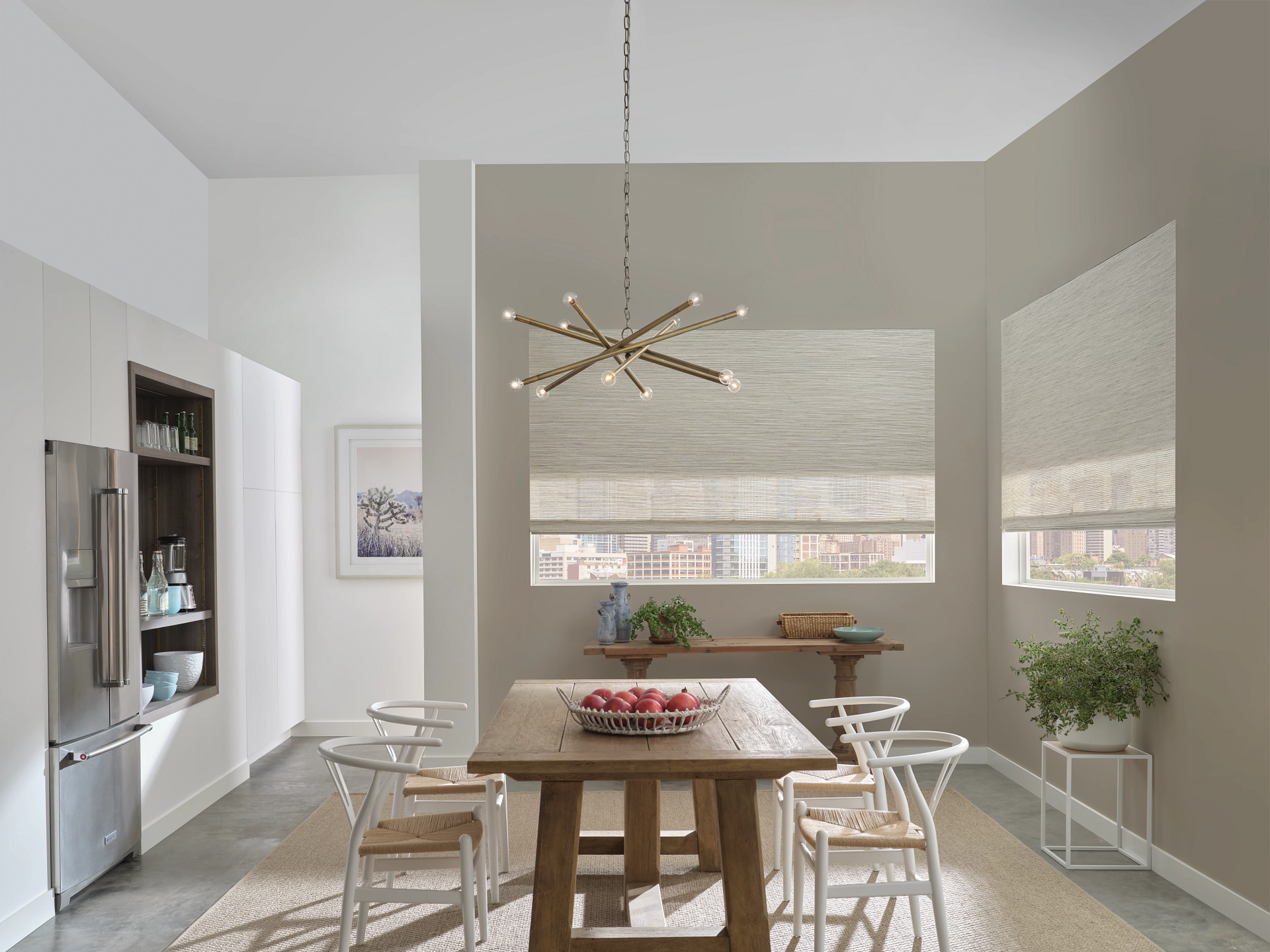 A dining room with a table and chairs and a chandelier hanging from the ceiling.