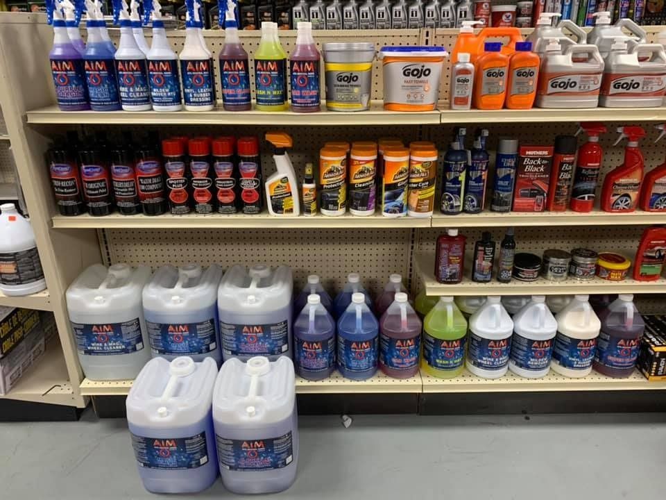 A store shelf filled with lots of cleaning products including dale.