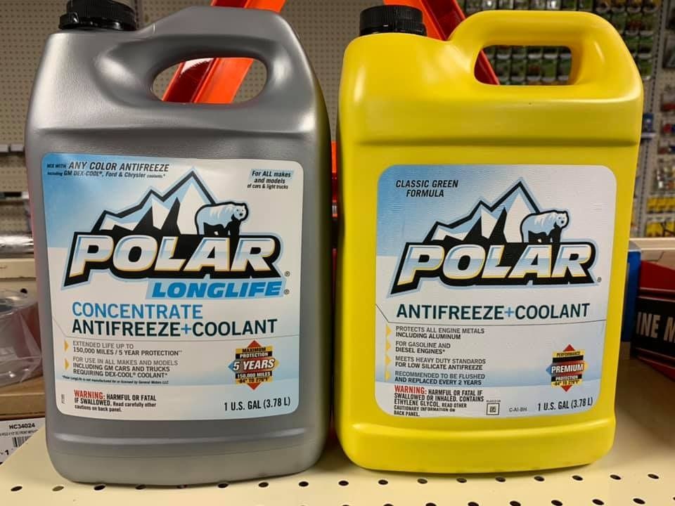 Two bottles of Polar Longlife concentrate antifreeze coolant.