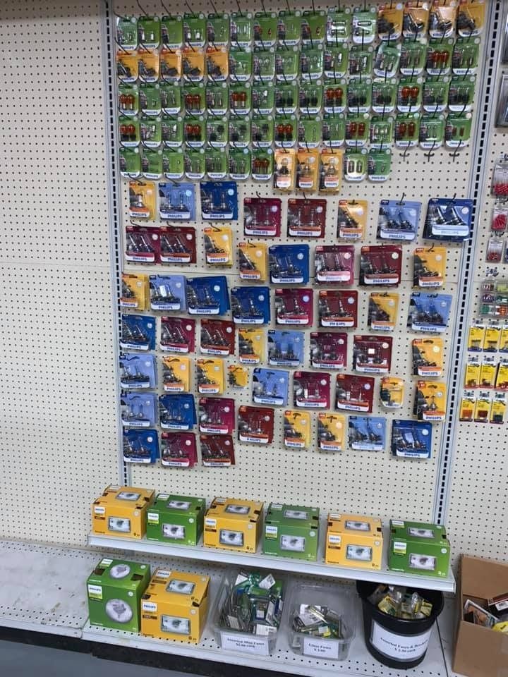 A store shelf filled with lots of different types of seeds.