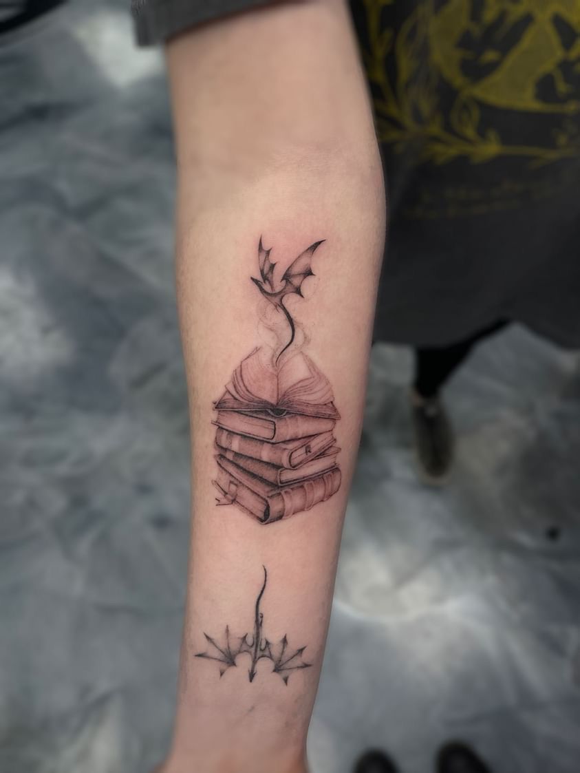 Man with a chest tattoo of a ship being attacked by a giant octopus