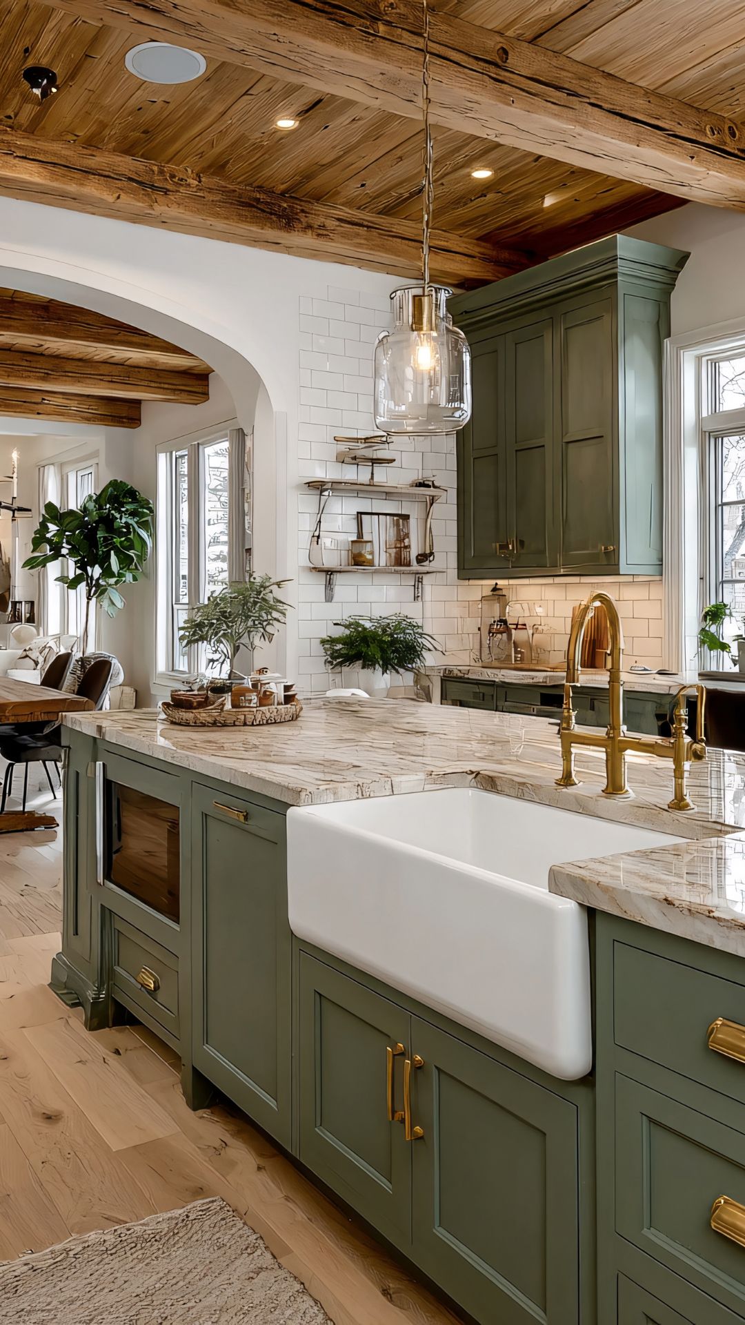 Green kitchen with white countertops and sink