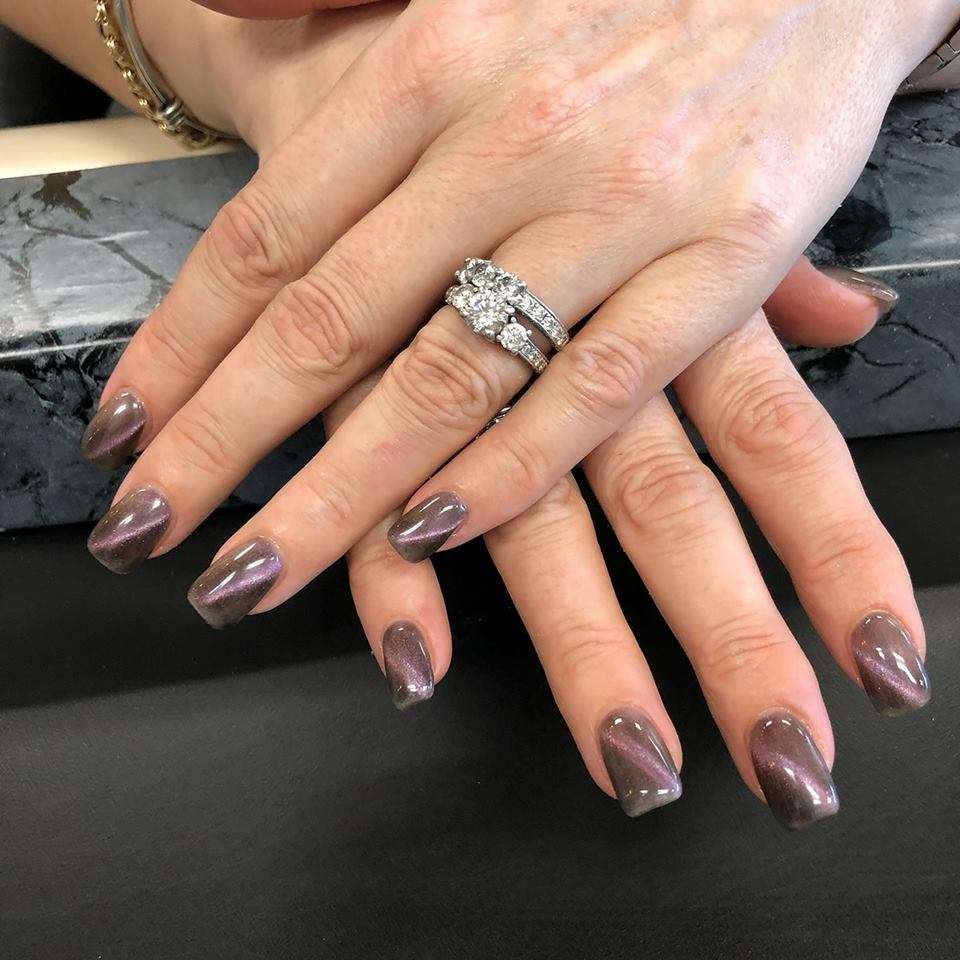 Glittery dark purple nails