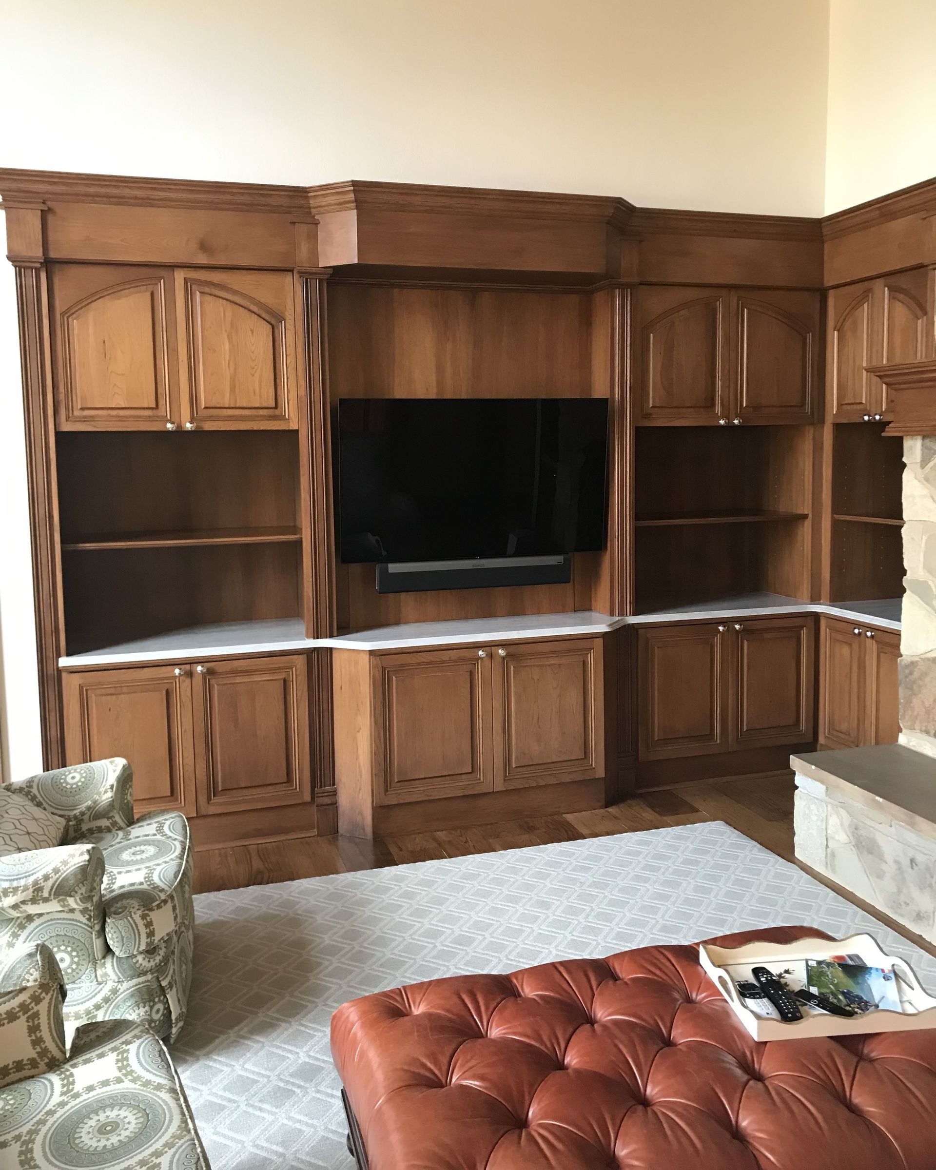 a large room with lots of windows and a desk and chair