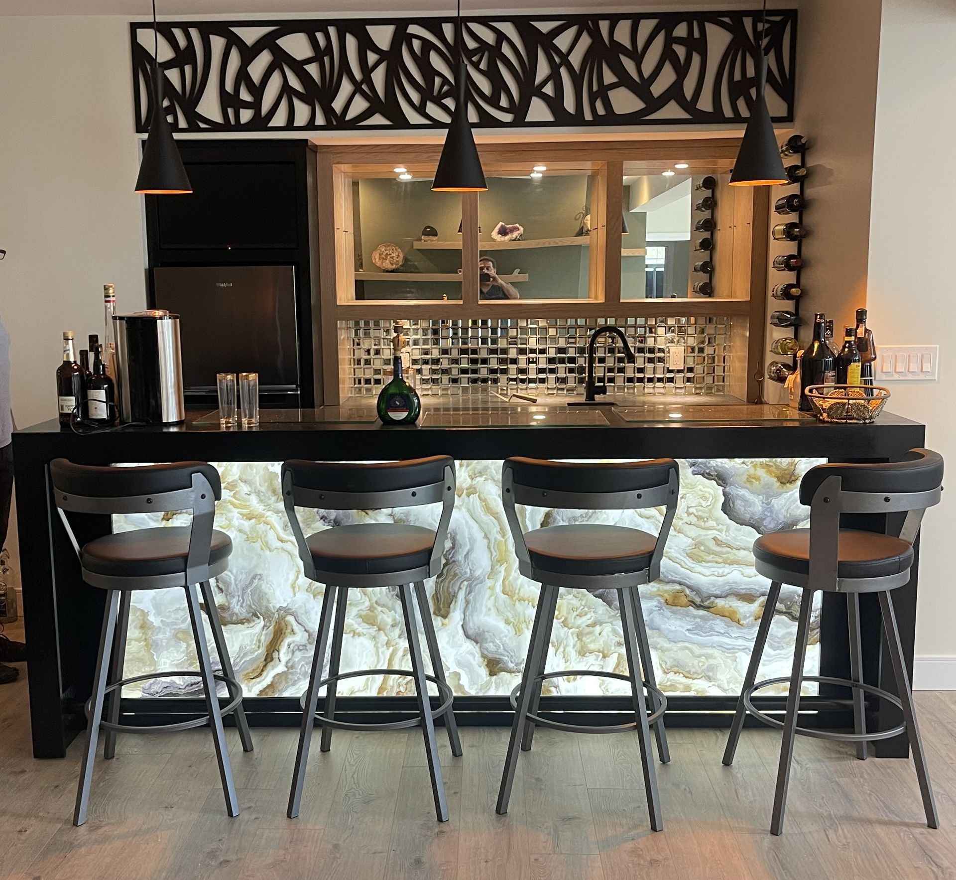 an empty kitchen with wooden cabinets and stainless steel appliances