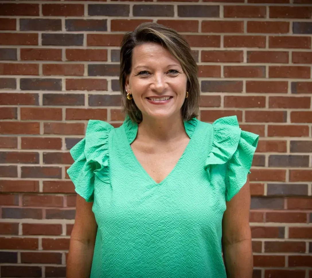 Photo of {{Team Member Name}}