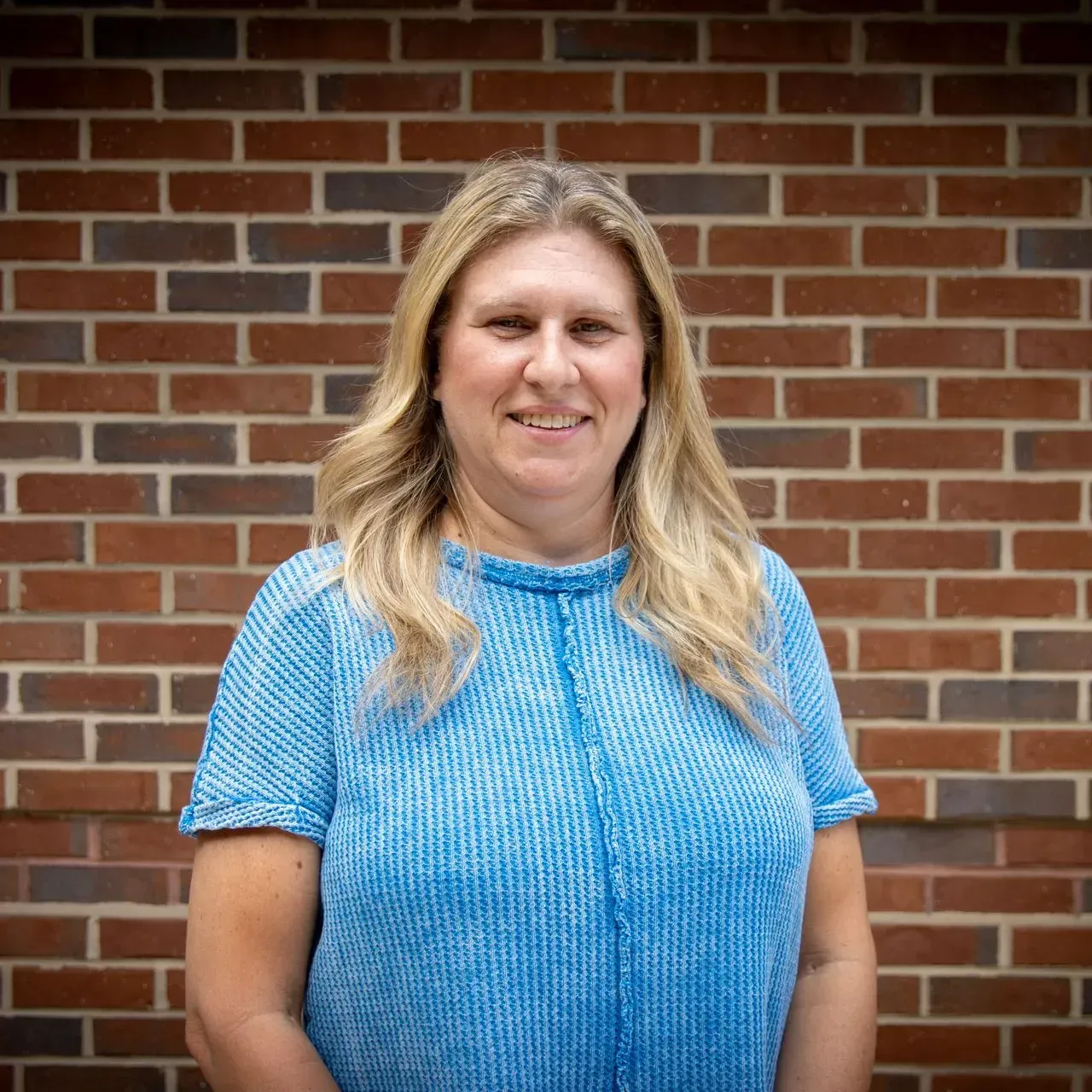 Photo of {{Team Member Name}}