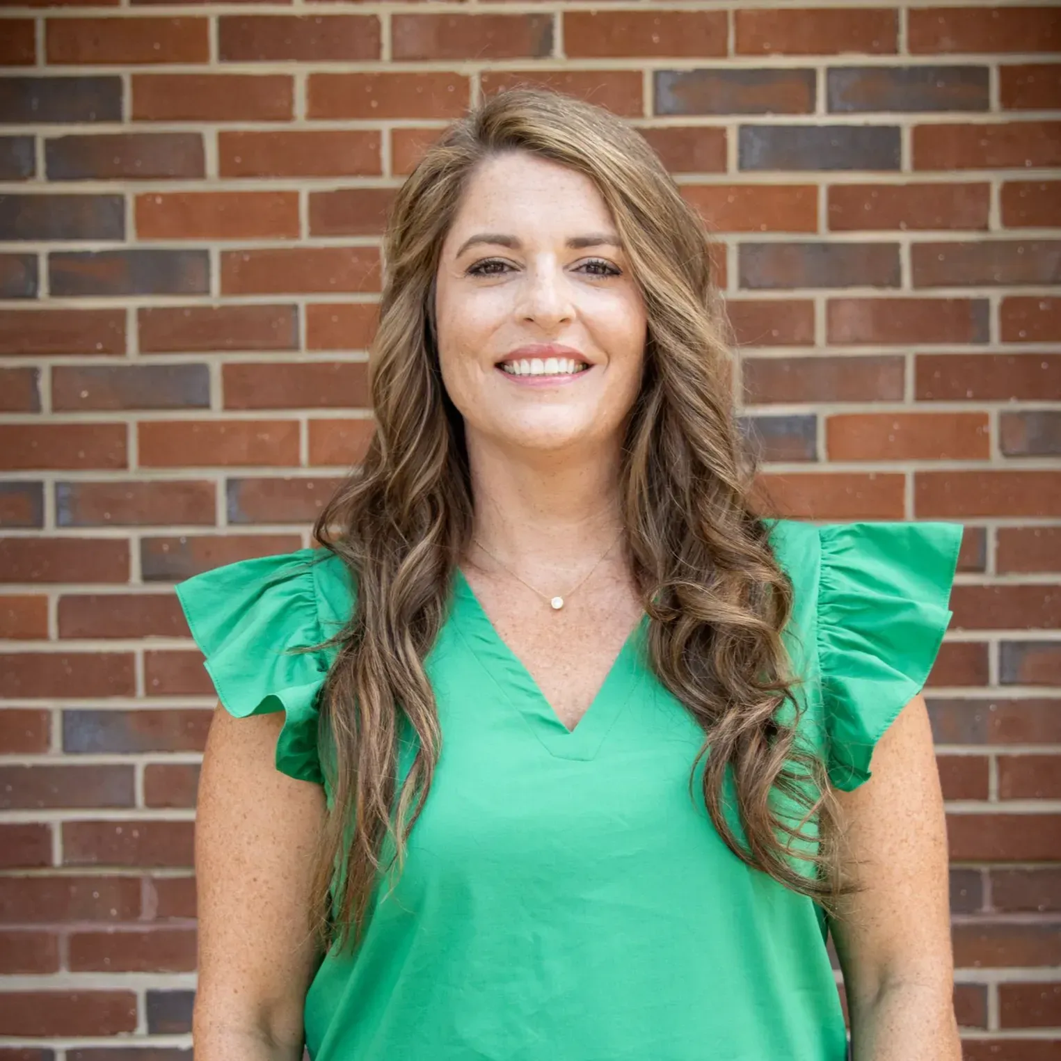 Photo of {{Team Member Name}}