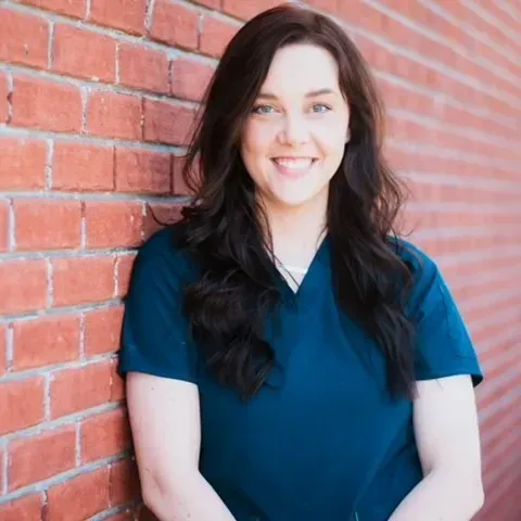 Photo of {{Team Member Name}}