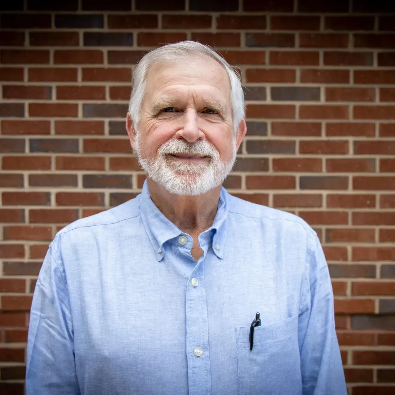 Photo of {{Team Member Name}}