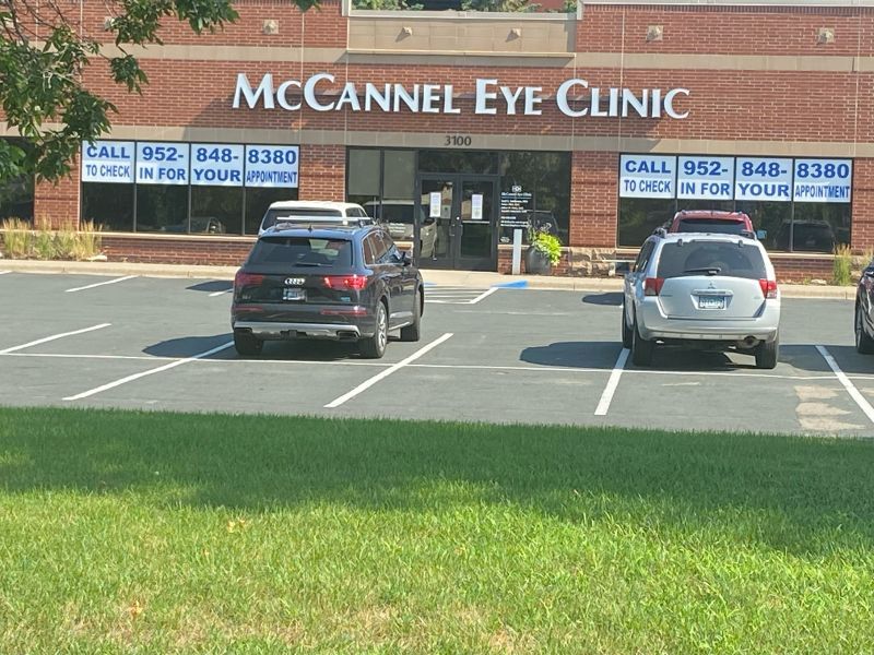 Cars are parked in front of a mccannel eye clinic