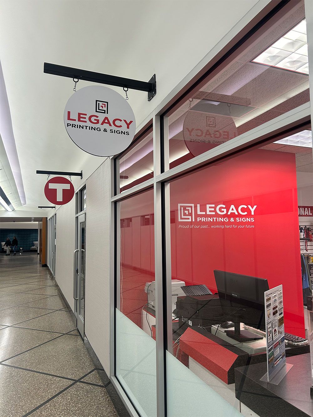 A store front with a sign that says legacy on it.