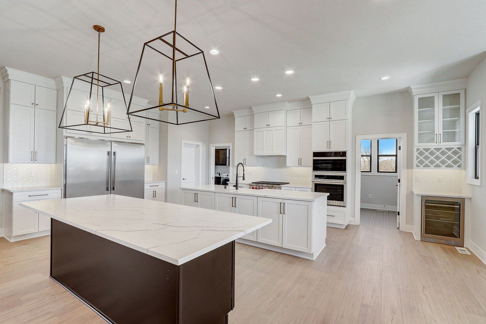There is a large island in the middle of the kitchen.