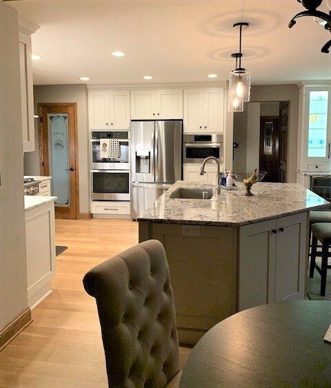 A kitchen with stainless steel appliances and granite counter tops