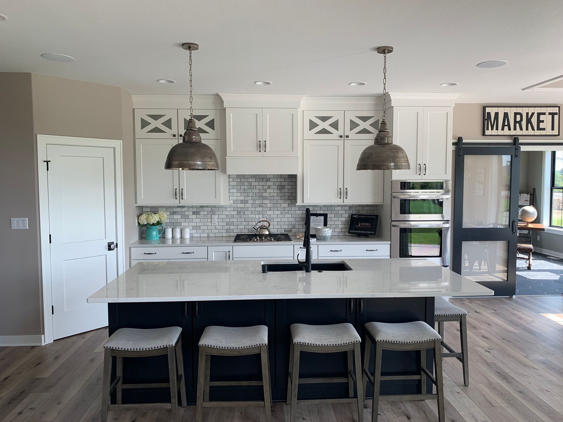 a beautiful kitchen island countertop with black cabinets below