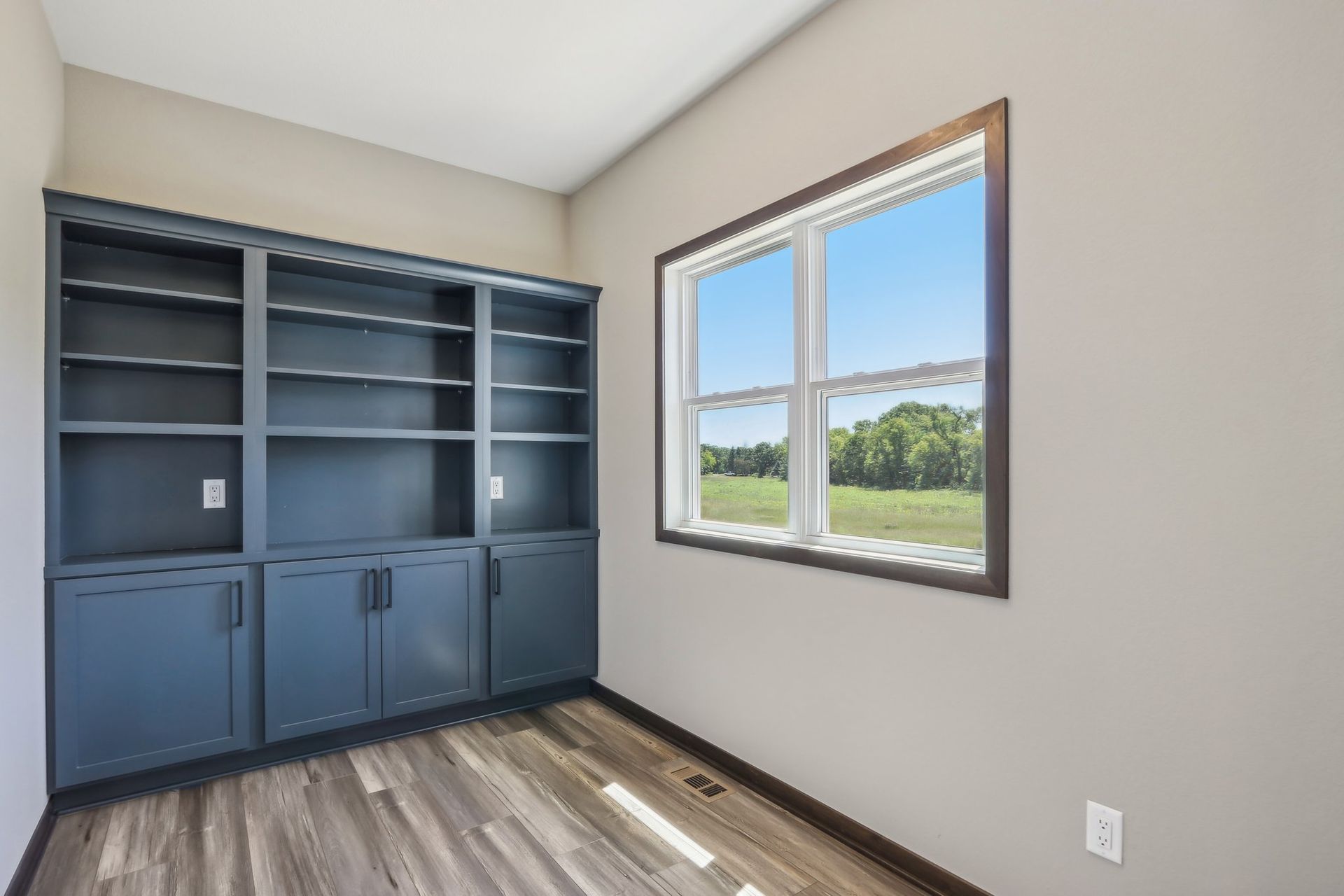 There is a large window in the middle of the room.