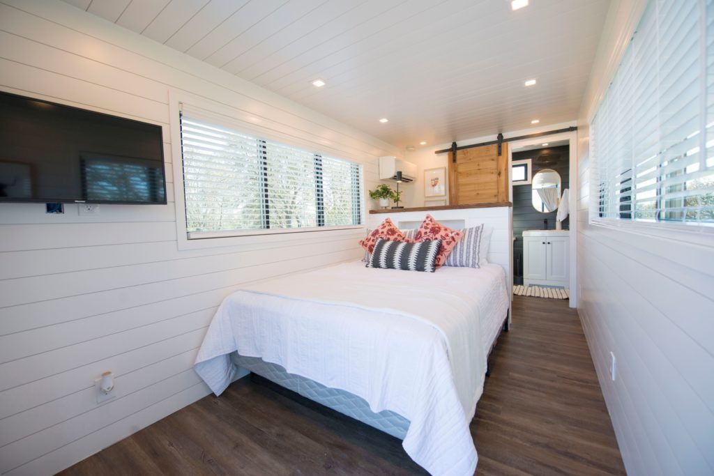 There is a large bed in the middle of the room.