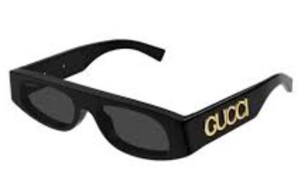 Black Gucci sunglasses with gold logo on the temple