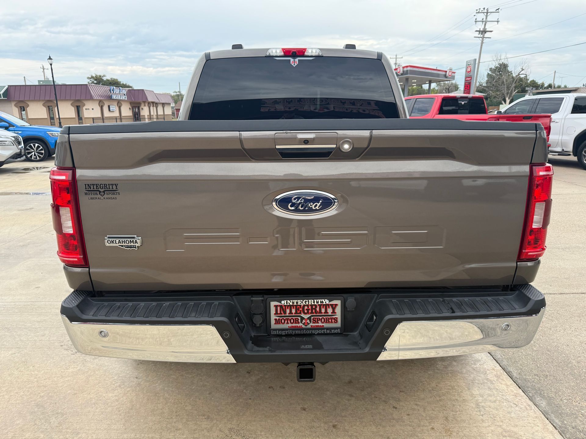 Brown Ford F-150 truck's rear view. 