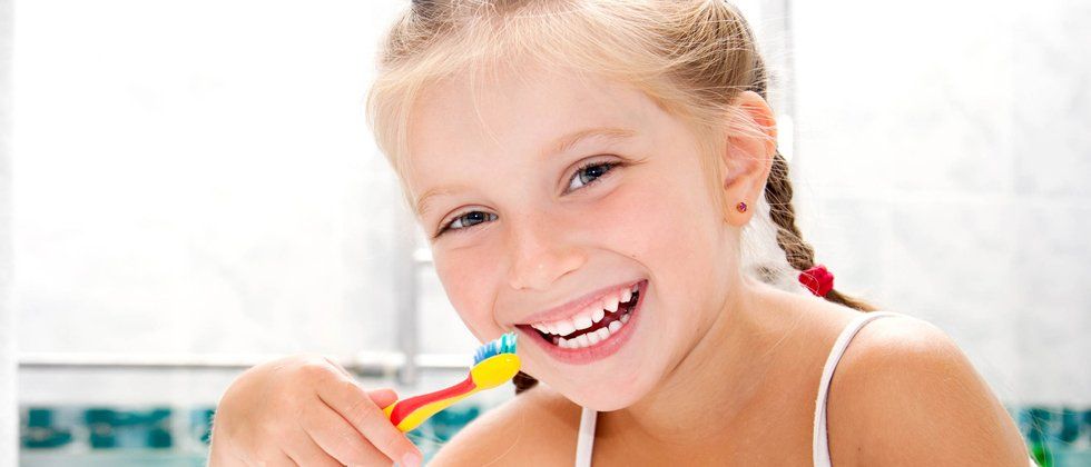 Little Girl Brushing Her Teeth