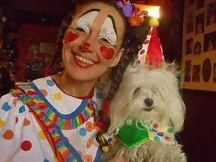 Clown with dog