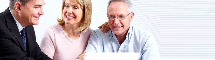 Senior couple with financial adviser