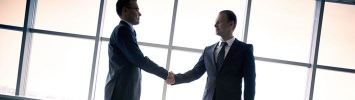 Two businesspeople shaking hand