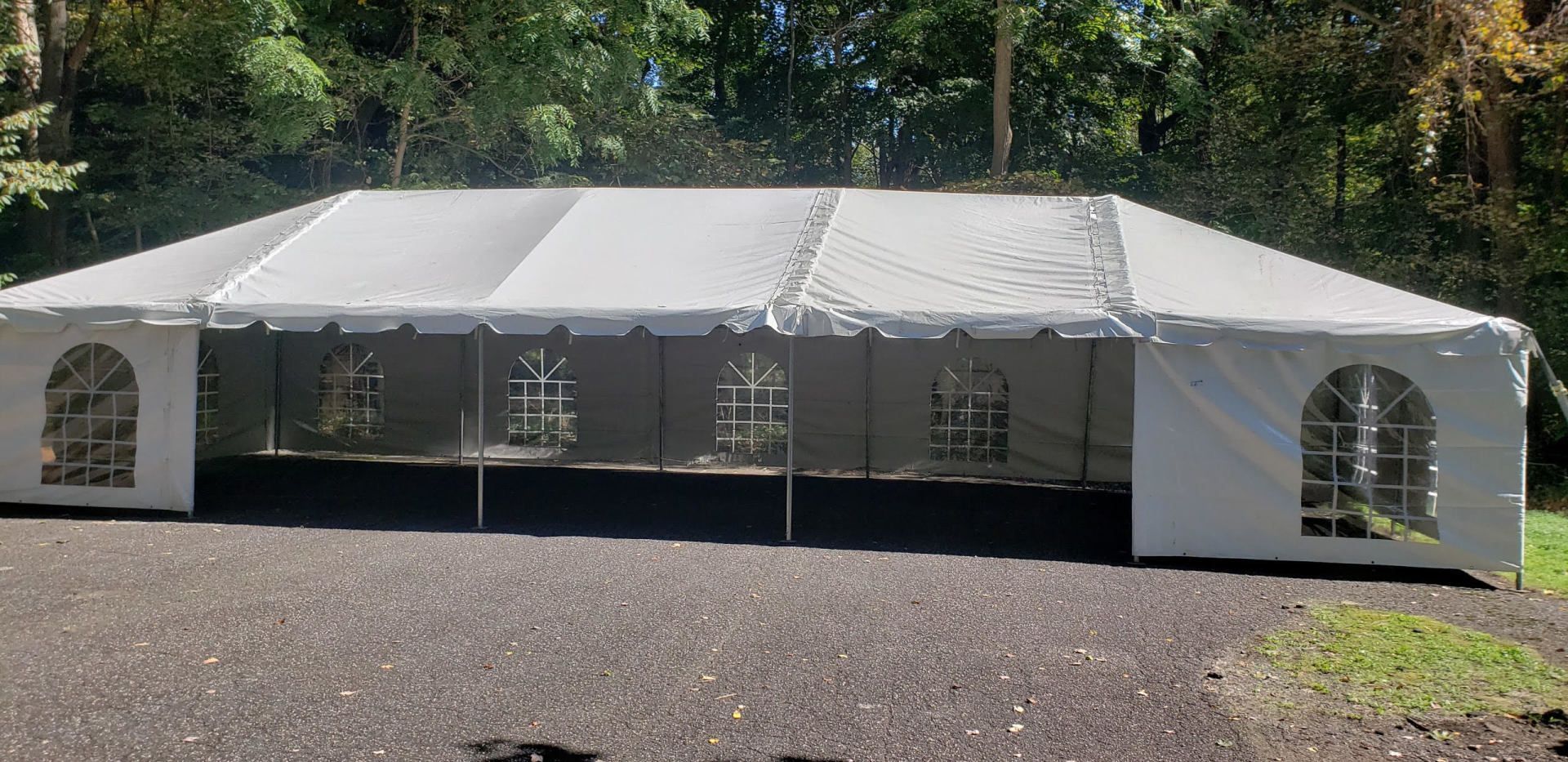 a white tent with windows