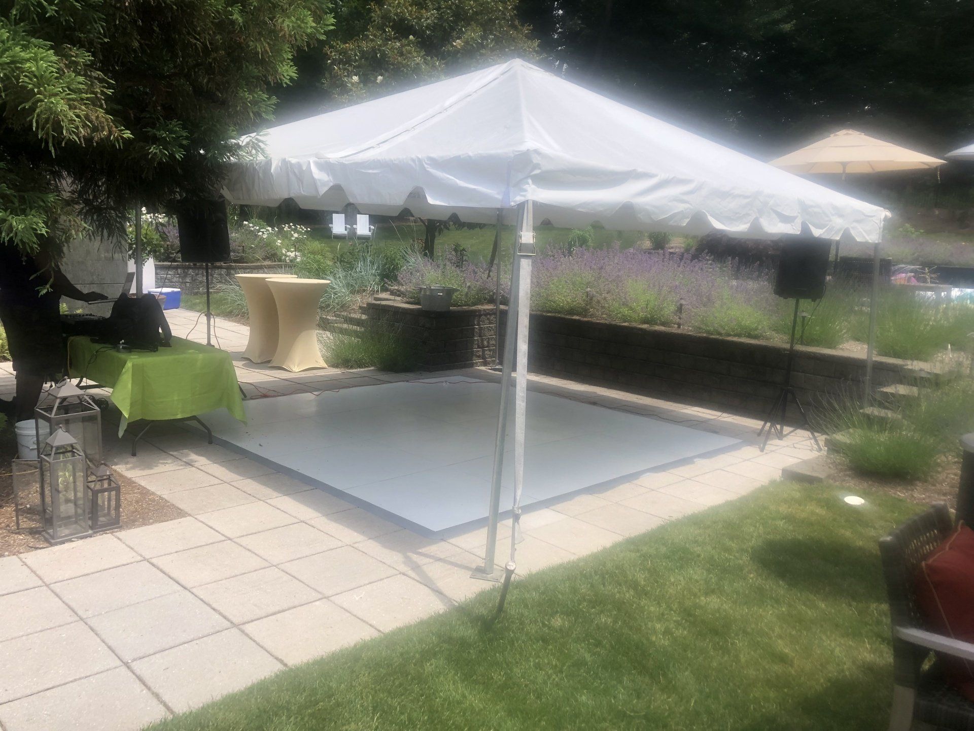 a white tent on a patio