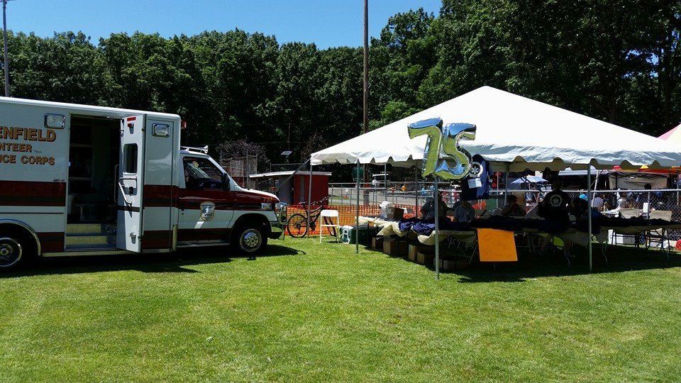 a ambulance parked in a field