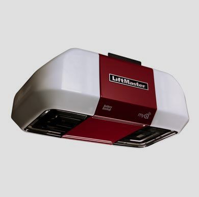 A red and white lift master garage door opener on a white background