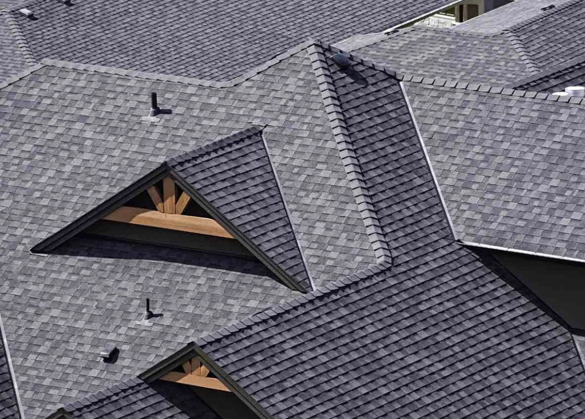 An aerial view of a roof with a lot of shingles on it.
